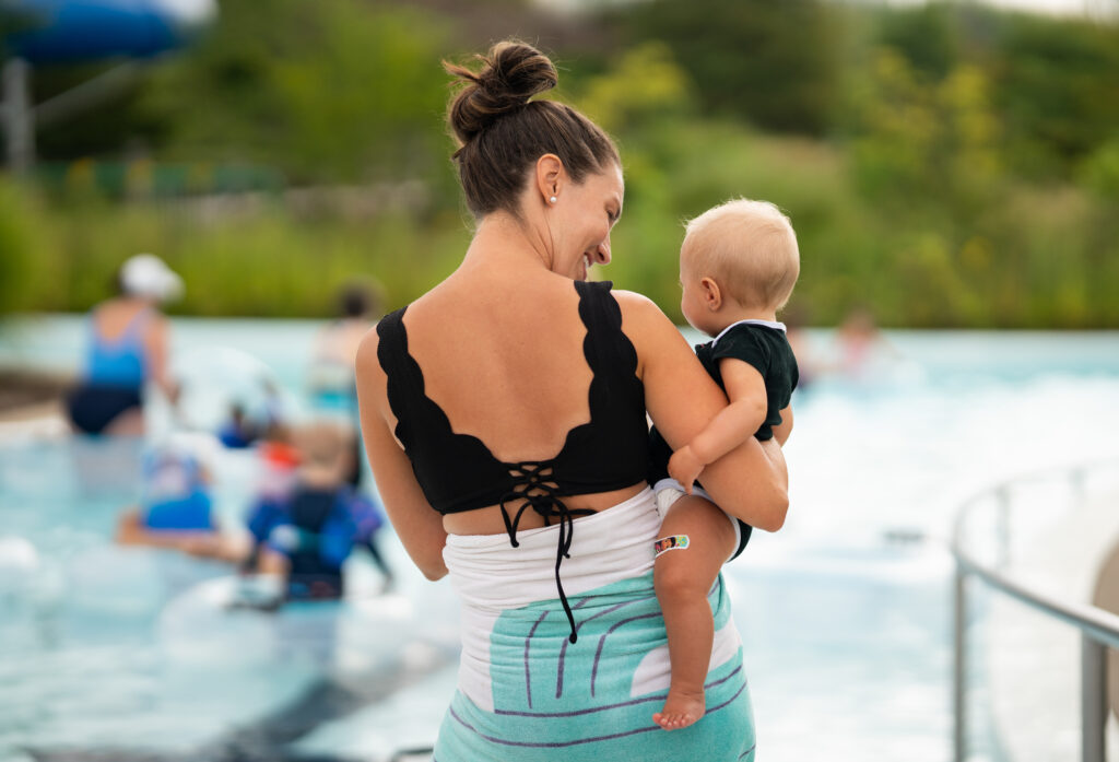 Parent and child at the waterpark. 